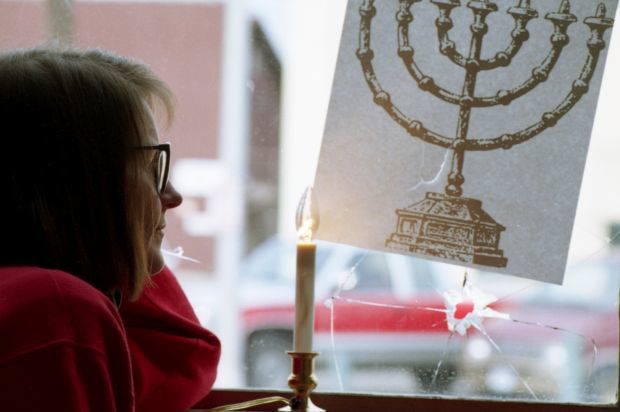 A window displaying a menorah